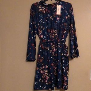 Long sleeved blue flower patterned dress